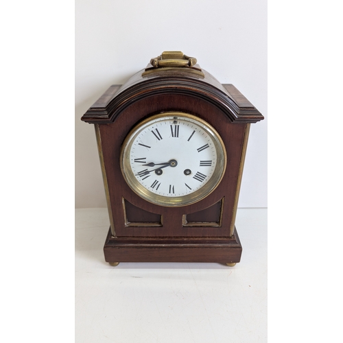 43 - Antique Mahogany & Brass Mounted Bracket / Mantel Clock

White enamel dial with Roman numerals and t... 