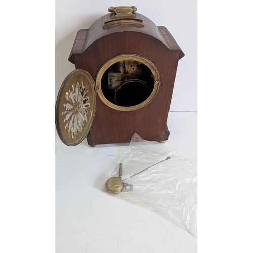 43 - Antique Mahogany & Brass Mounted Bracket / Mantel Clock

White enamel dial with Roman numerals and t... 