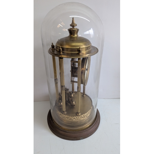 44 - Antique Brass Four-Glass Anniversary / Torsion Clock Under Glass Dome

Decorative enamel dial with A... 