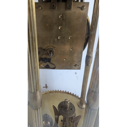 44 - Antique Brass Four-Glass Anniversary / Torsion Clock Under Glass Dome

Decorative enamel dial with A... 
