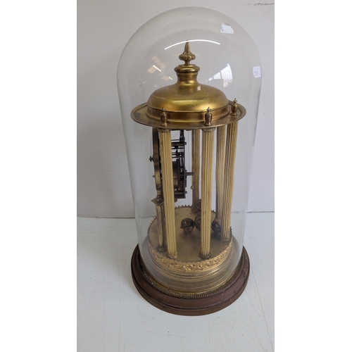 45 - Antique Brass Four-Glass Anniversary / Torsion Clock Under Glass Dome

Cream dial with stylised Arab... 