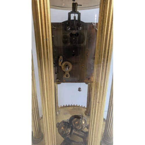 45 - Antique Brass Four-Glass Anniversary / Torsion Clock Under Glass Dome

Cream dial with stylised Arab... 