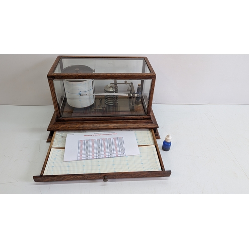 46 - Vintage Short & Mason Ltd London Aneroid Barograph in Glazed Oak Case

Precision meteorological reco... 