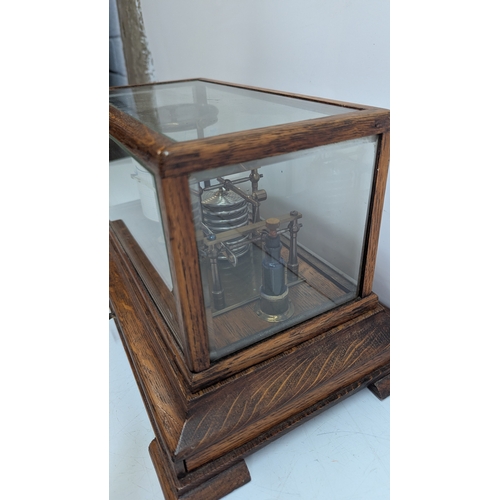 46 - Vintage Short & Mason Ltd London Aneroid Barograph in Glazed Oak Case

Precision meteorological reco... 