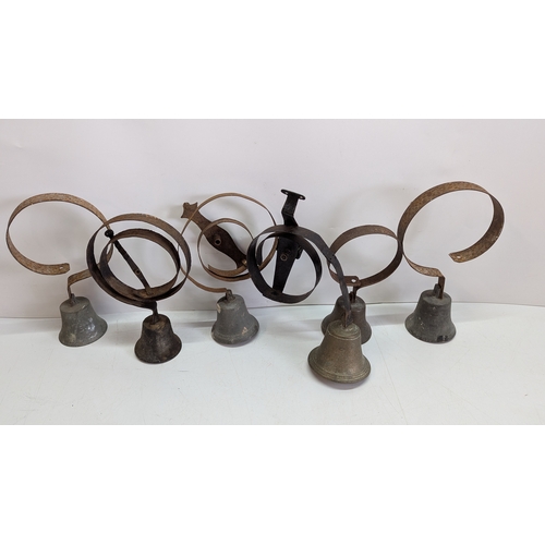 47 - Collection of Six Antique Servants’ / House Bell Springs with Bells

Comprising six wrought-iron spr... 