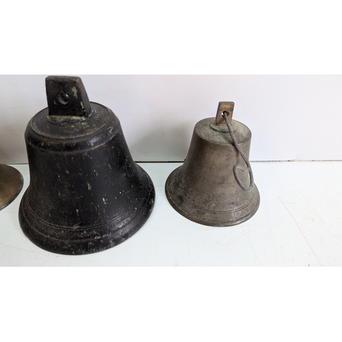 48 - Collection of Five Antique Brass and Metal Bells

Of varying sizes and forms, including three brass ... 