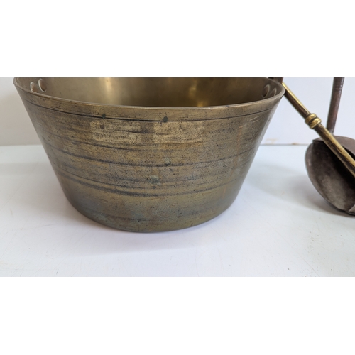 52 - Collection of Antique Brass & Iron Hearth / Kitchen Utensils

Comprising a large brass cauldron or p... 