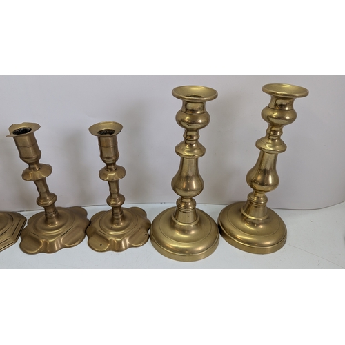 54 - Collection of Twelve Vintage Brass Candlesticks

Comprising six pairs of varying traditional forms, ... 
