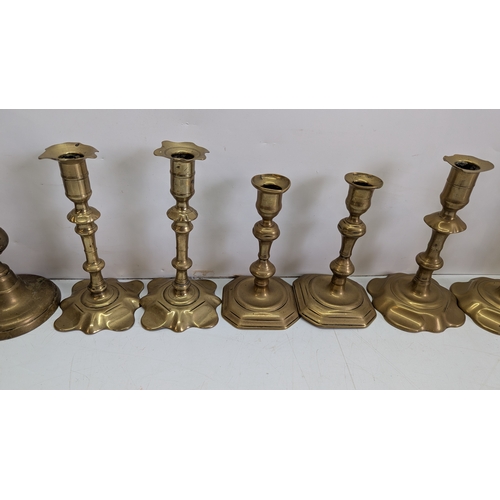 54 - Collection of Twelve Vintage Brass Candlesticks

Comprising six pairs of varying traditional forms, ... 