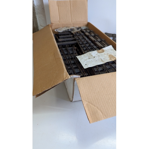 18 - Vintage O Gauge Model Railway Track, Points and Accessories

A substantial quantity of straight, cur... 