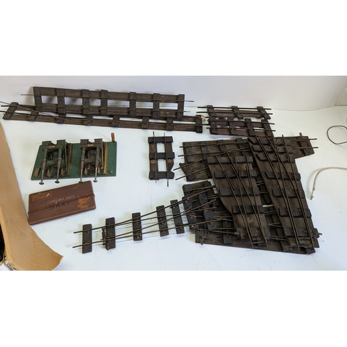 18 - Vintage O Gauge Model Railway Track, Points and Accessories

A substantial quantity of straight, cur... 