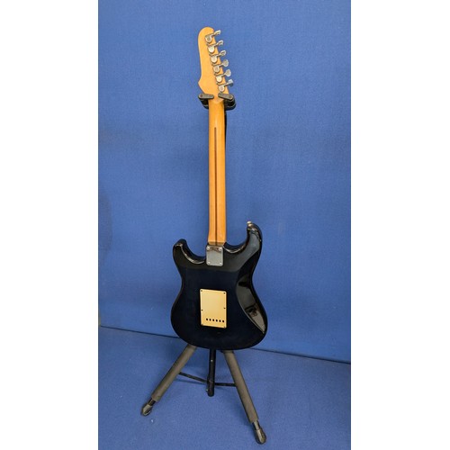 136 - Ibanez Blazer Series ‘Custom Made’ HSS electric guitar and Hercules Stand

Circa 1990s, Stratocaster... 