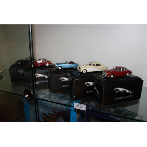 269 - 5 x boxed jaguar model cars