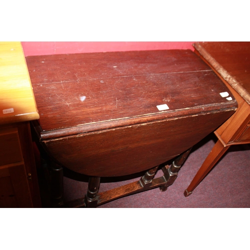 63 - 1 Edwardian oak gate leg table