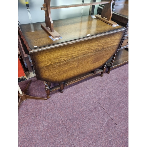 13 - Large Edwardian oak barley twist pie crust edge gate leg dining table