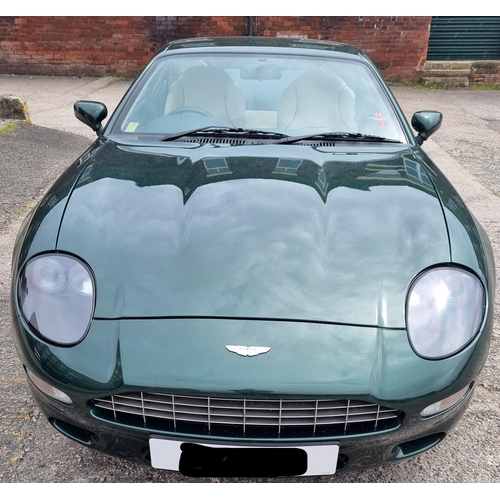 113 - 1 x 1995 Aston DB7 3.3 litre petrol in green with cream leather interior approx 21000 miles on the c... 