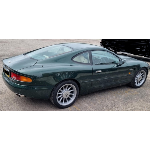 113 - 1 x 1995 Aston DB7 3.3 litre petrol in green with cream leather interior approx 21000 miles on the c... 