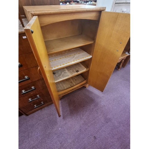 79 - 1 x Herbert and Gibbs’s oak storage cupboard