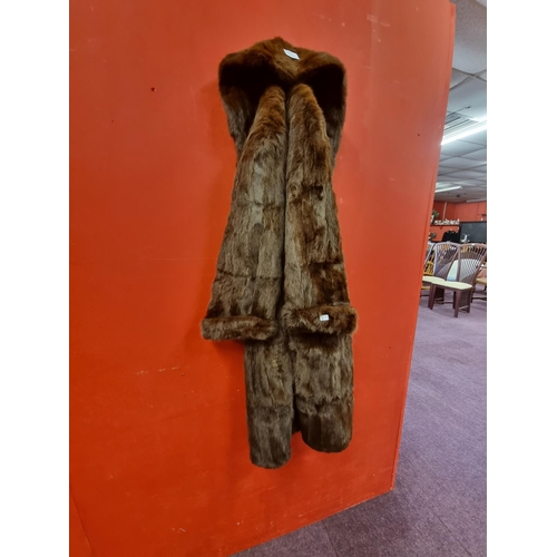 64 - 1 x brown fur silk lined coat