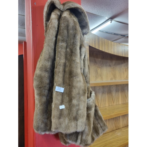 107 - 1 x faux fur coat by Astraka