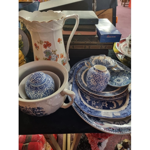 296 - Selection of blue and white ware pottery and large water jug