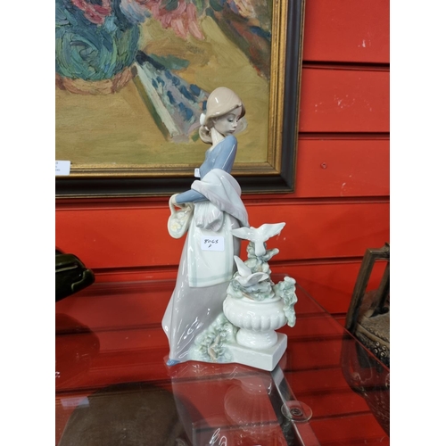 245 - 1 x lladro girl with doves figurine no damage