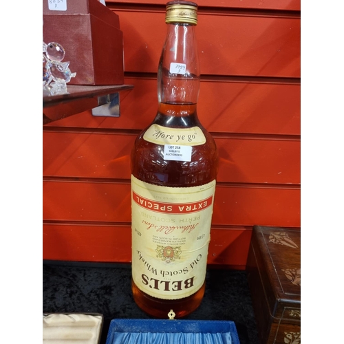 258 - 1 x 4.5 liter aged 8 years bells scotch whiskey