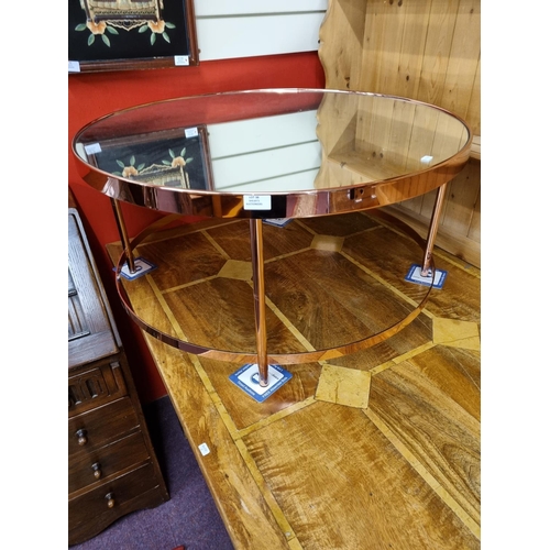 38 - 1 x rose gold metal framed mirror topped table