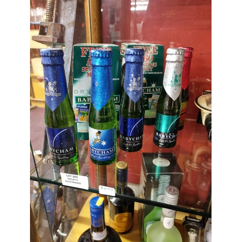 selection of babycham bottles all full with 1 x cherry brandy