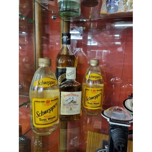 210 - 1 x bottle of highland prince whiskey 1of famouse grouse and 2 x Schweppes tonic