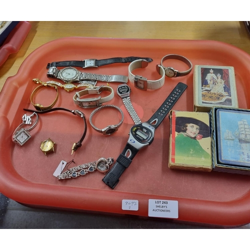 243 - 1 x tray containing various watches and playing cards