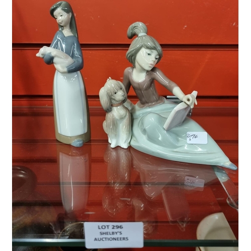 296 - 2 x lladro small figures girl with dog and book and girl with pig in arms