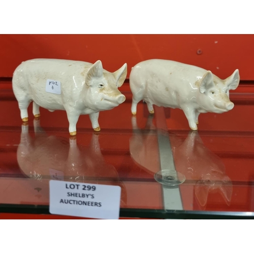 299 - 1 x pair of beswick male and female pig figures