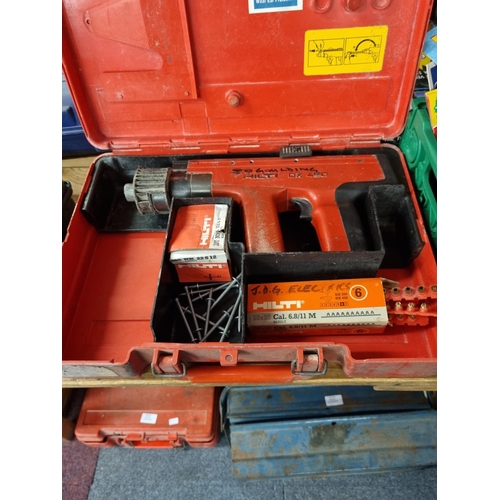 65 - 1 x Hilti tool box containing gas powered Hilti nail gun