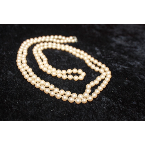 108 - 1 x silver clasp pearl necklace 48 inches long