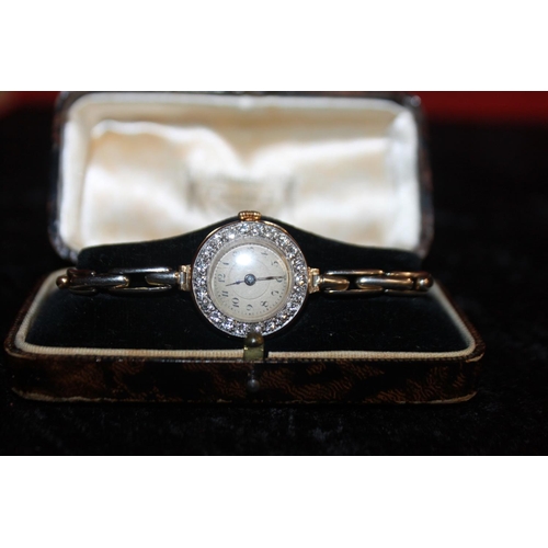 111 - 1x ladies 18ct gold and diamond bezel set watch on bracelet