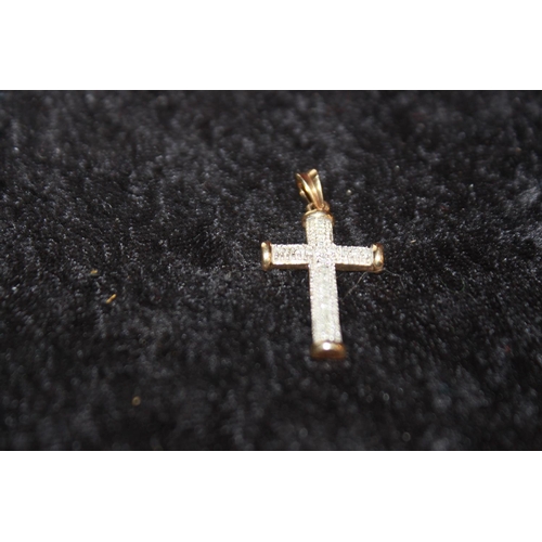 117 - 1 x 9ct gold and diamond set cross pendant