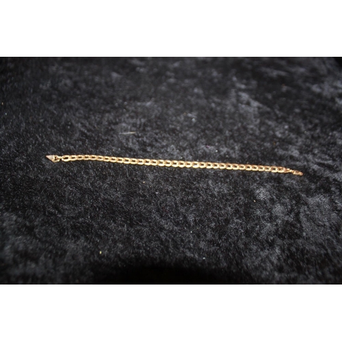 148 - 1 x 9ct gold flat curb link bracelet