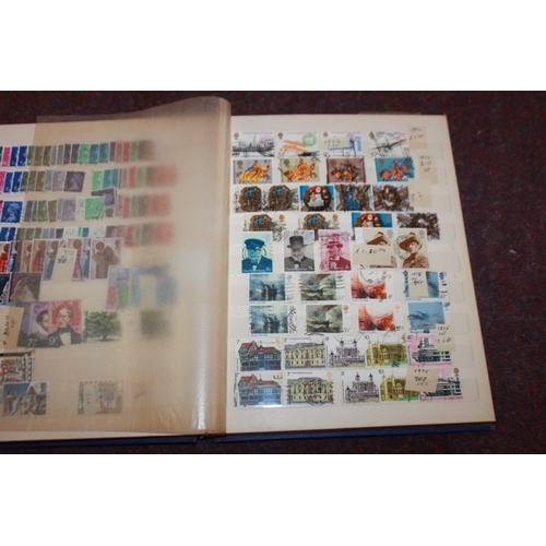 306 - 1 x stamp album containing British stamps from 1911 -1982