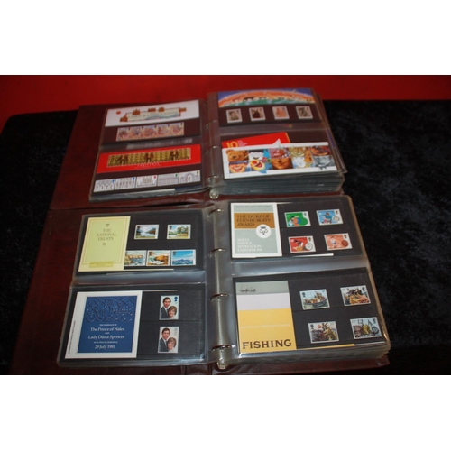 313 - 2 x Royal Mail presentation pack folder containing Royal Mail mint stamp packs