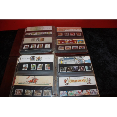 313 - 2 x Royal Mail presentation pack folder containing Royal Mail mint stamp packs