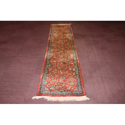 58 - 1 x red woven  floral pattern floor runner size 10 ft 3 long and 2ft 3 wide