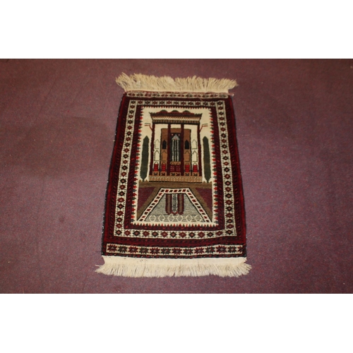 62 - 1 x Iranian rug with temple design size 2ft 1 by 3ft 2