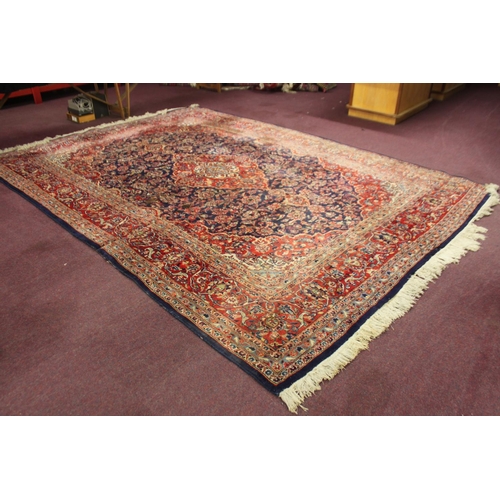 63 - 1 x large red and blue full wool rug size 9ft 8x13ft 9