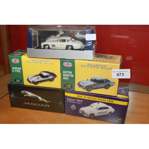 473 - 4 x various mint boxed collectors cars with 1 boxed in good condition vehicle