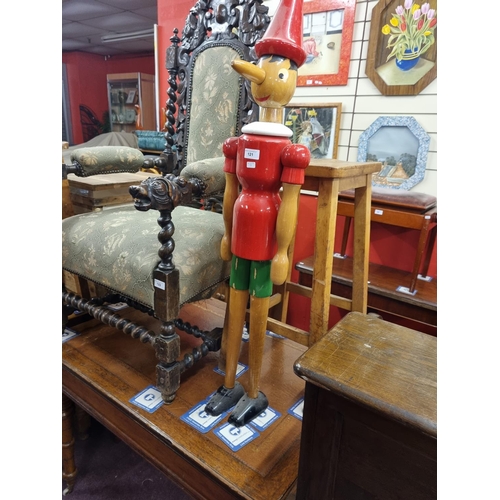 121 - One wooden Pinocchio figure