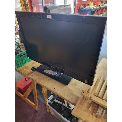 18 - 1 x soundwave 32 inch flatscreen television with dvd
