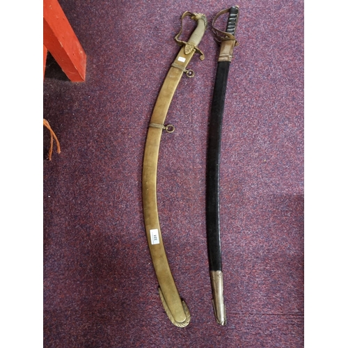 331 - Two reproduction officers swords