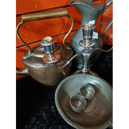 332 - One copper kettle with pewter water jug silverplated candle stick pewter bowl and two napkin rings