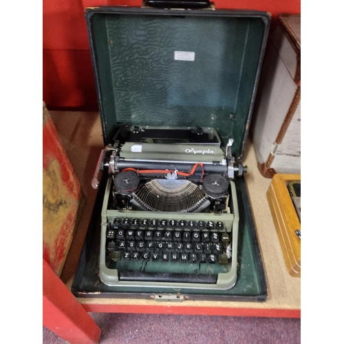 355 - One Olympia case typewriter